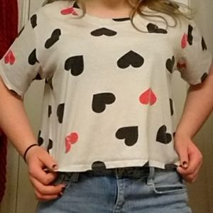 Short sleeved broken heart shirt.
